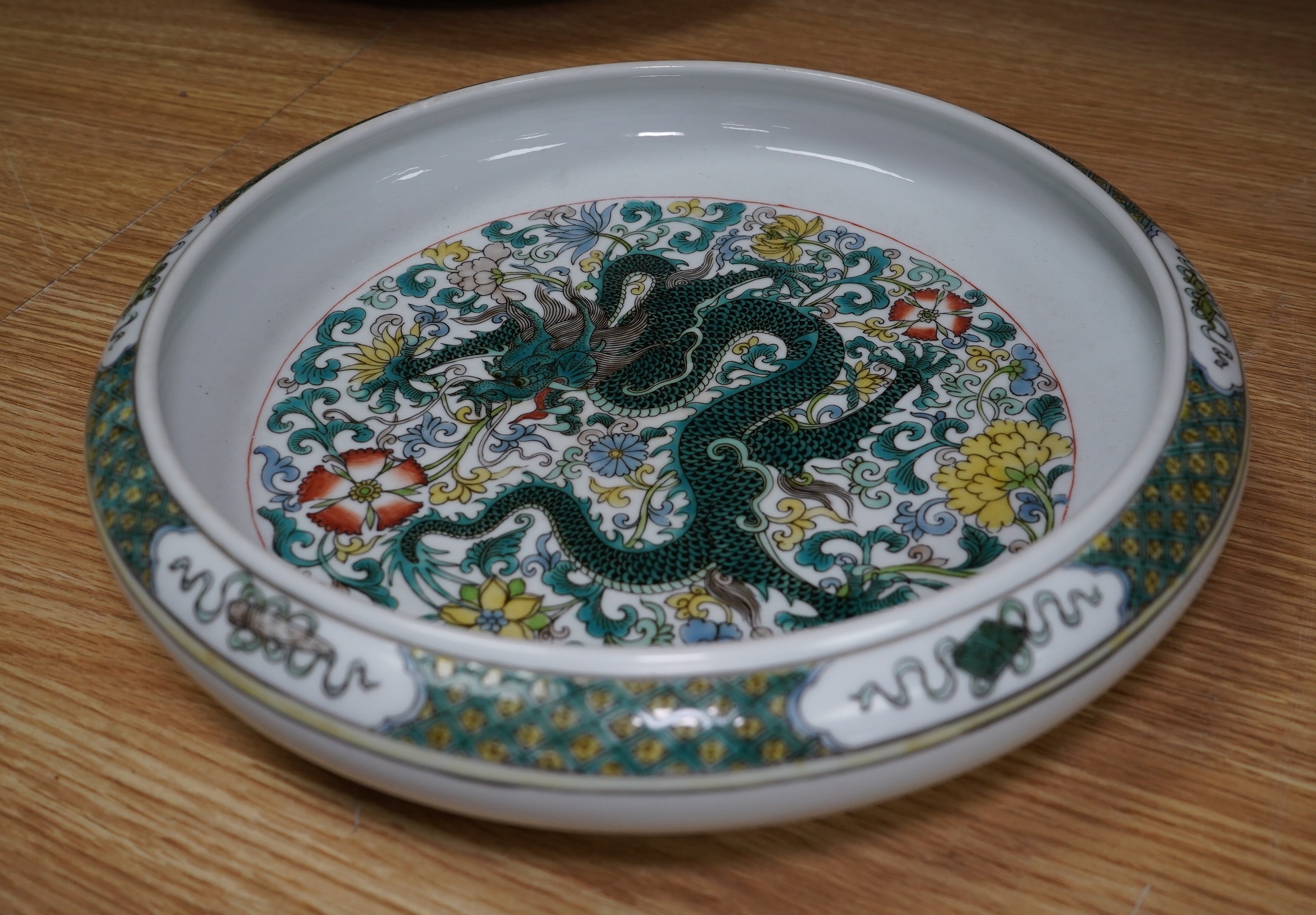 A Chinese famille verte dragon bowl, 29cm in diameter. Condition - good